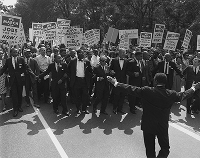 Civil Rights leaders in a march in Washington DC against Jim Crow laws, 1963. From the National Archives.