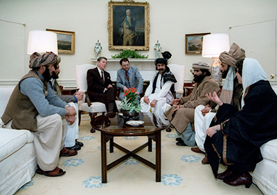 President Ronald Reagan meeting with mujahideen fighters at the White House in 1983.