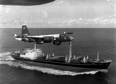 A US military aircraft shadows a Soviet freighter enroute to Cuba during the Cuban Missile Crisis in 1962